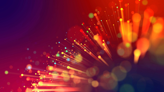 Abstract explosion of multicolored shiny particles or light rays like laser show. 3d render abstract beautiful background with light rays colorful glowing particles, depth of field, bokeh