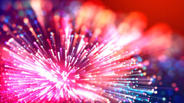 istock Abstract explosion of multicolored shiny particles or light rays like laser show. 3d render abstract beautiful background with light rays colorful glowing particles, depth of field, bokeh. 1183185834