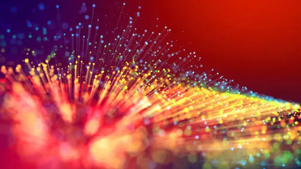 Photo of Abstract explosion of multicolored shiny particles or light rays like laser show. 3d render abstract beautiful background with light rays colorful glowing particles, depth of field, bokeh.