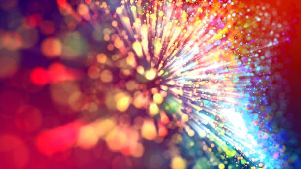 Abstract explosion of multicolored shiny particles or light rays like laser show. 3d render abstract beautiful background with light rays colorful glowing particles, depth of field, bokeh.