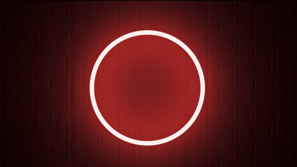 istock circle shaped red neon light on a wooden wall circular 1183205143