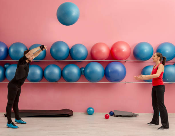 istock Couple in the Gym 1183207654