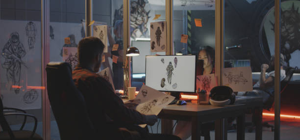istock Graphic designer drawing video game art 1183215786