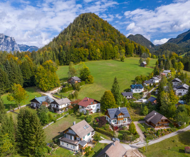 Mountain Village, Bad Aussee, Styria, Austria Aerial panorama of the beautiful Mountain Village, Bad Aussee, Steiermark, Austria. Austrian Alps Panorama. Converted from RAW. autumn field tree mountain stock pictures, royalty-free photos & images