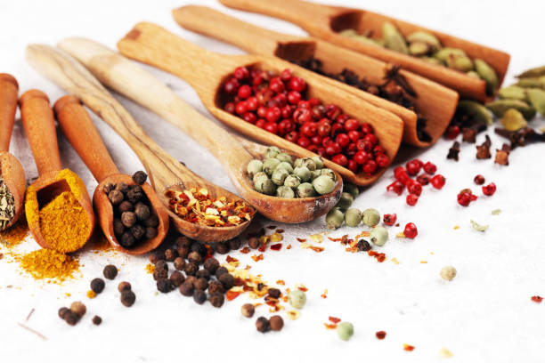 istock Spices with pepper on table. Food and cuisine ingredients for cooking on rustic background 1183219364