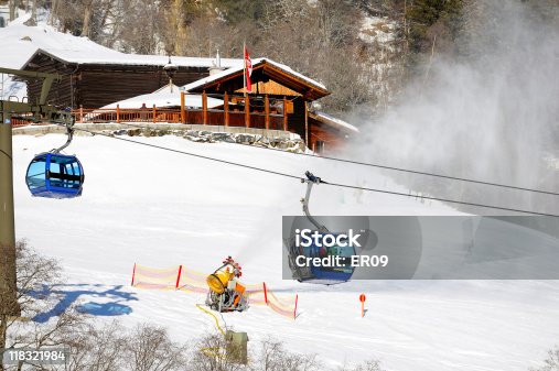 istock ropeway and snow cannon in the mountains 118321984