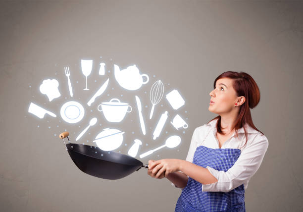 istock Young woman with kitchen accessories icons 1183222282