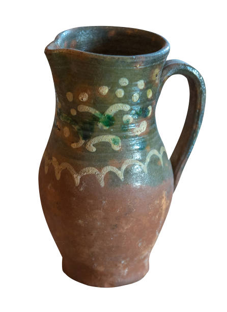 istock clay jug isolated on a white background. vintage jug front view. 1183223706