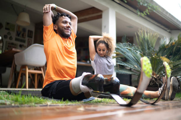 Friends stretching in the yard