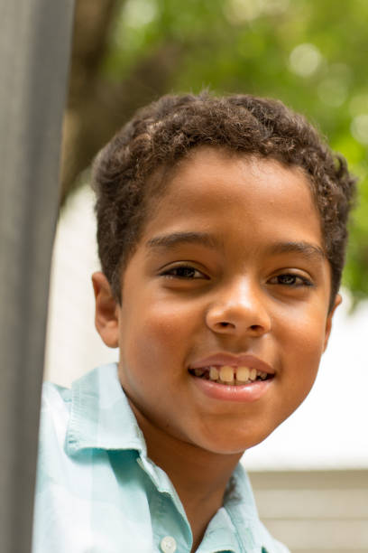 istock Young mixed race little boy playing and smiling. 1183226149