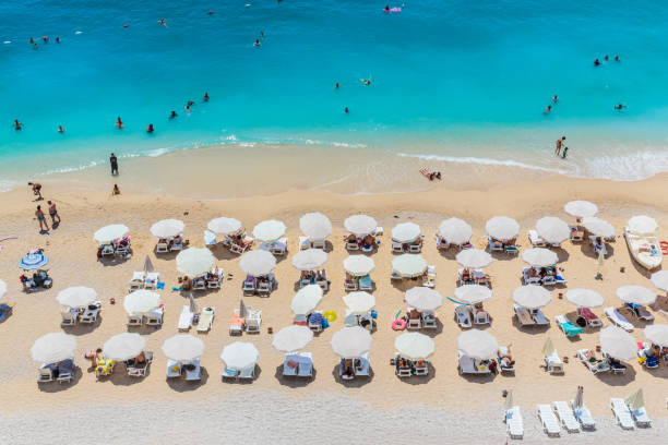 istock Peaople resting on the beach, umbrella rows, Kaputash, Turkey 1183226418