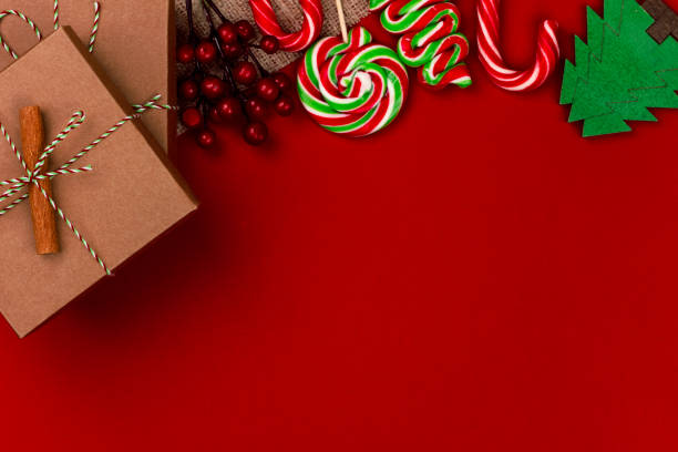 istock christmas decorations and gift box on red background 1183226479