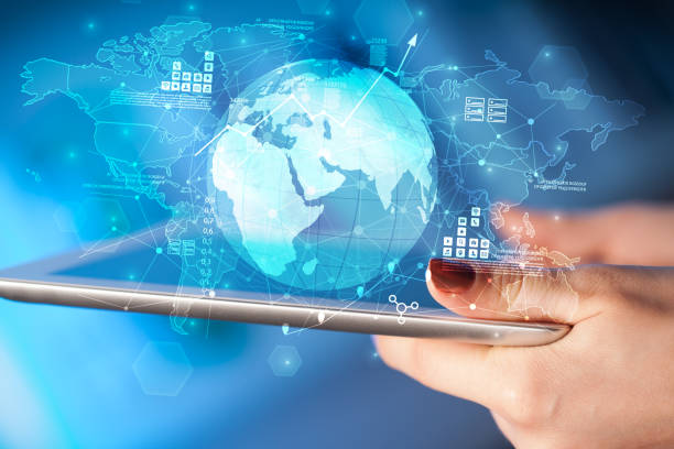 istock Hand touching tablet with global estate report concept 1183227632