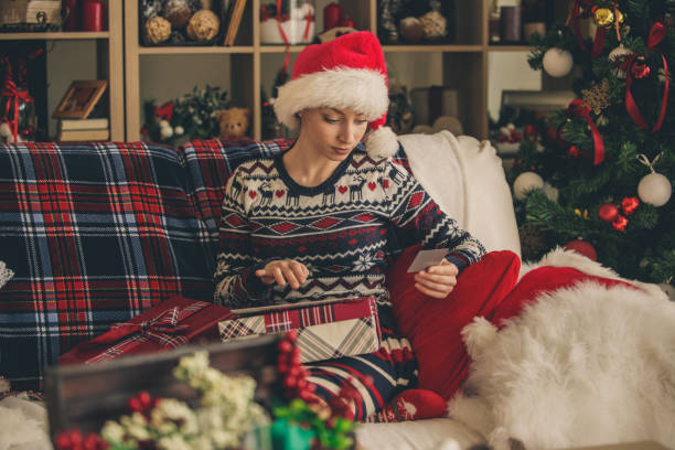 istock Young woman shopping online 1183228783