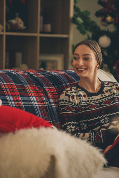 istock Young woman relaxing on the couch 1183229968