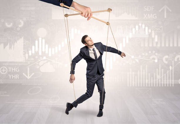 istock Puppet businessman with financial concept 1183231080
