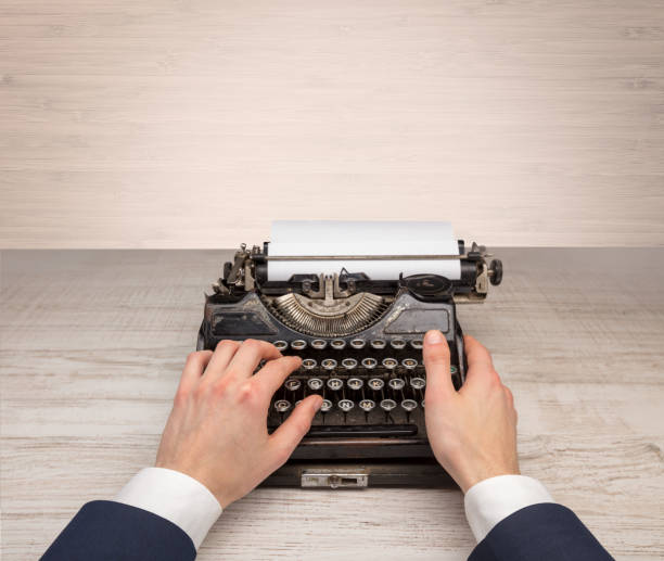 istock First person perspectve hand writing on an oldschool typewriter 1183231092