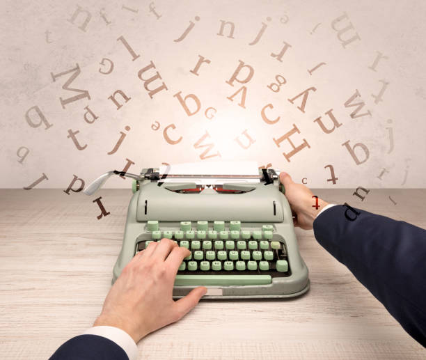 istock First person perspective elegant hand typing with flying letters concept 1183231105