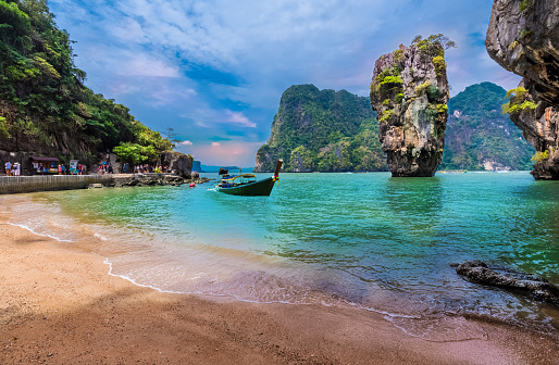James Bond island and the famous Khao Phing Kan stone surrounded by blue clean water in Thailand