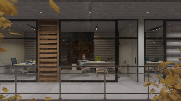 istock Side View of Illuminated Office Rooms at Night 1183242181