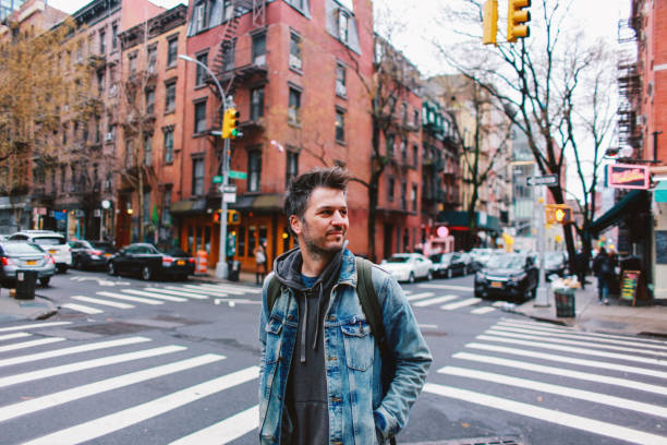 istock Young man looking in Manhattan, NYC 1183244528
