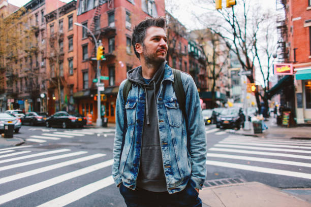 istock Young man looking in Manhattan, NYC 1183244554