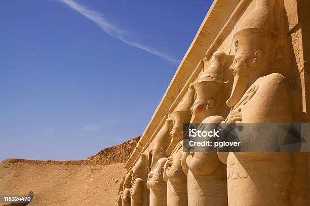 Seven Statues Look Out Over The Nile Luxor West Bank Stock Photo - Download Image Now