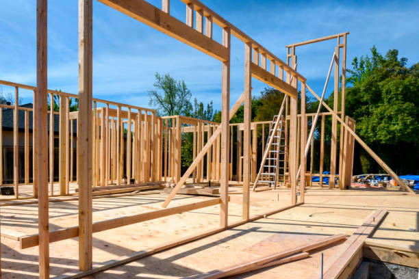 istock Construction building a two story residential house 1183246024