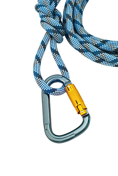 istock climbing equipment - carabiner without scratches and blue rope 118324877