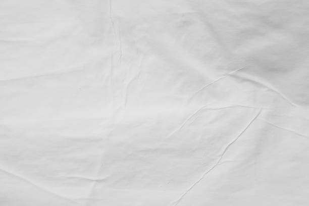 gray colored wet paper wrinkled texture background stock photo