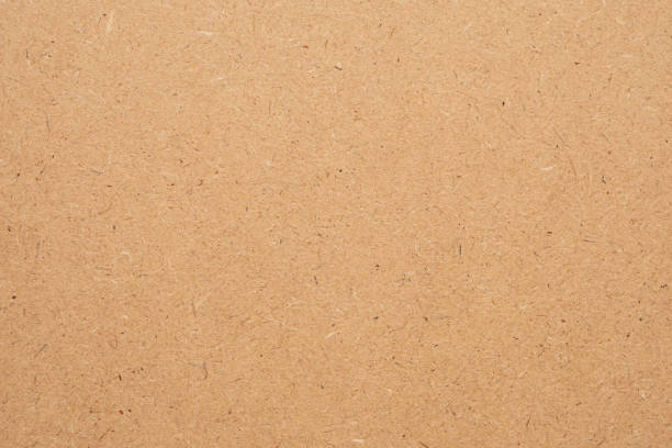 istock Old brown recycled eco paper texture cardboard background 1183253556