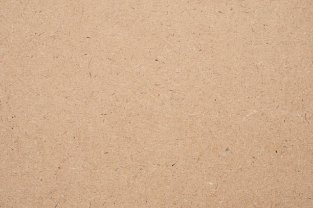 istock Old brown recycled eco paper texture cardboard background 1183253565