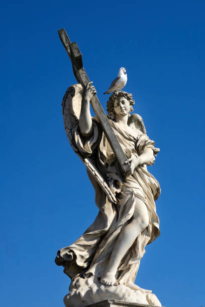 istock Bernini Angel Cross Seagull Castel Ponte Sant Angelo Rome Italy 1183257515