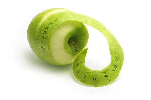 Green Apple con peelings mesure - foto de stock