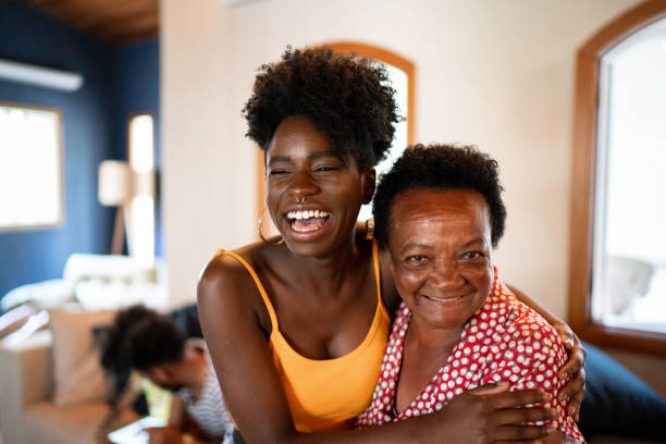 istock Happy mother and daughter embracing 1183258099