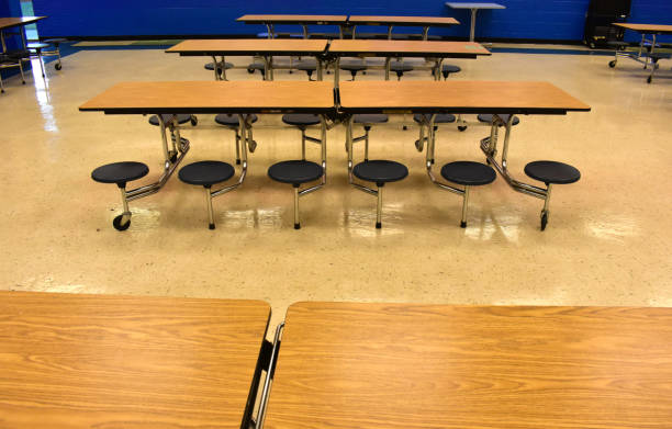 istock Cafeteria lunch tables at school 1183259663