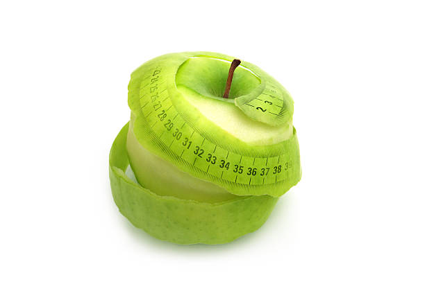 Pomme verte et peelings mesure - Photo