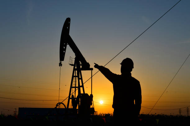 istock The oil workers in the job 1183270406