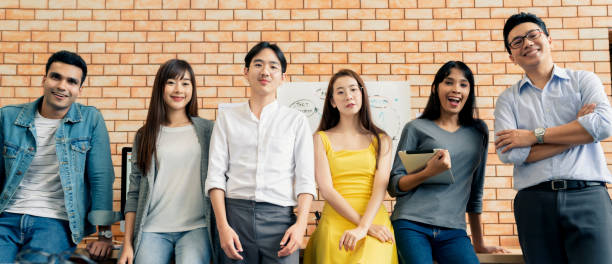 istock front view successful business teamwork standing with energy and welcome  Group of happy creative on motivation meeting 1183276685