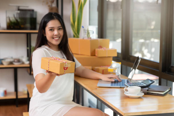 istock Customer receiving many parcel from delivery after online shopping 1183279563