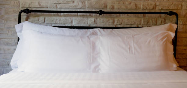 istock Pillows on bed in contemporary bedroom interior decorating ideas concept 1183281117
