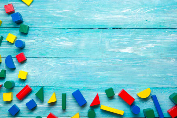 istock Kids educational developing toys frame on white background. Top view. Flat lay. Copy space for text 1183288326