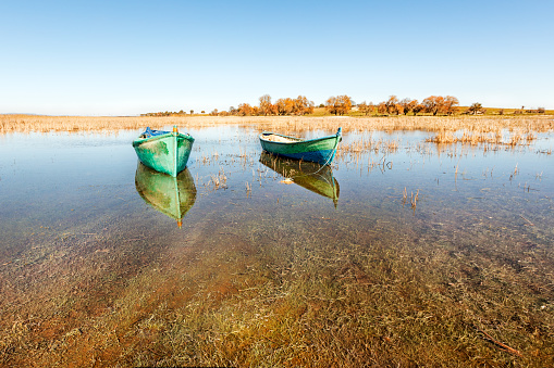 Landscape of the Lake Beysehir and old fishing boats in Beysehir, Konya, Turkey.