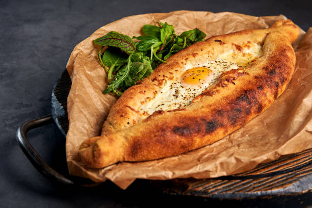 istock delicious Adjarian khachapuri with greens 1183292504