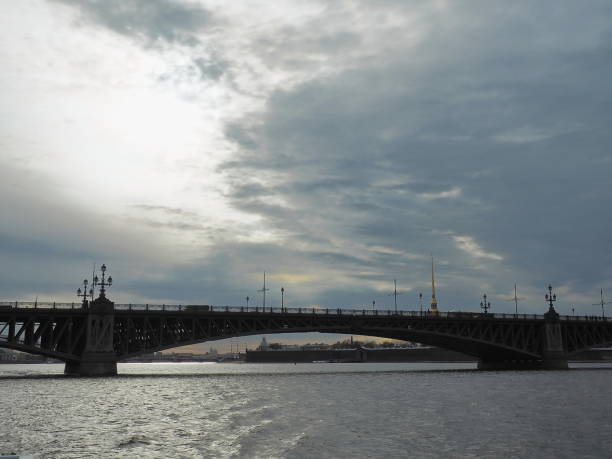 Landscape with Troitskiy Bridge and the Peter and Paul fortress on stormy day. stock photo