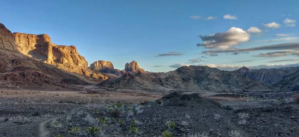 istock Dark and light worlds collide when sun sets over canyon 1183294480