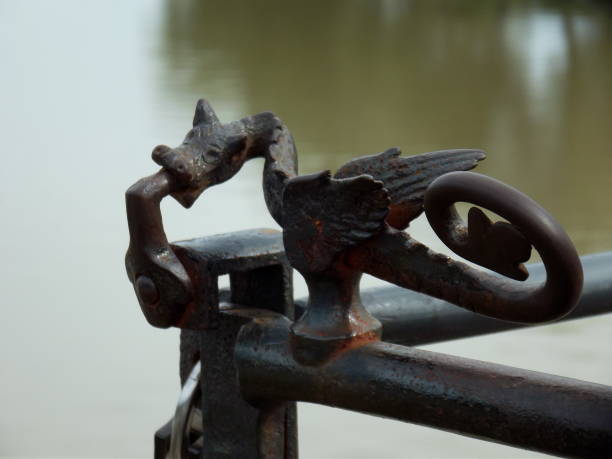istock Metal dragon decoration on a rail 1183295245