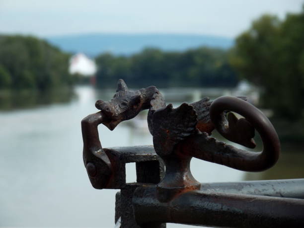 istock Metal dragon decoration on a rail 1183295250
