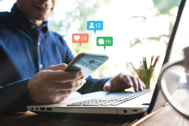 istock Man Checking His Social Media Account Using His Smart Phone 1183296433