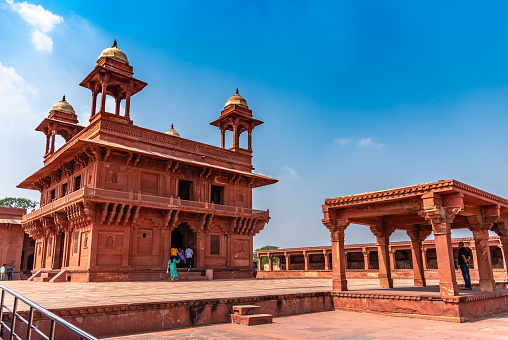 Agra,Utter Pradesh / India - October 13,2019. Diwan-E-Khas, also known as the Hall of Private Audiences, with an ornately carved central stone pillar, built for Emperor Akbar in Fatehpur Sikri.